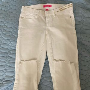 White raw hemmed skinny jeans